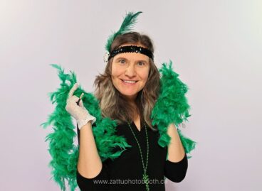 Lady dressed up with Gatsby props